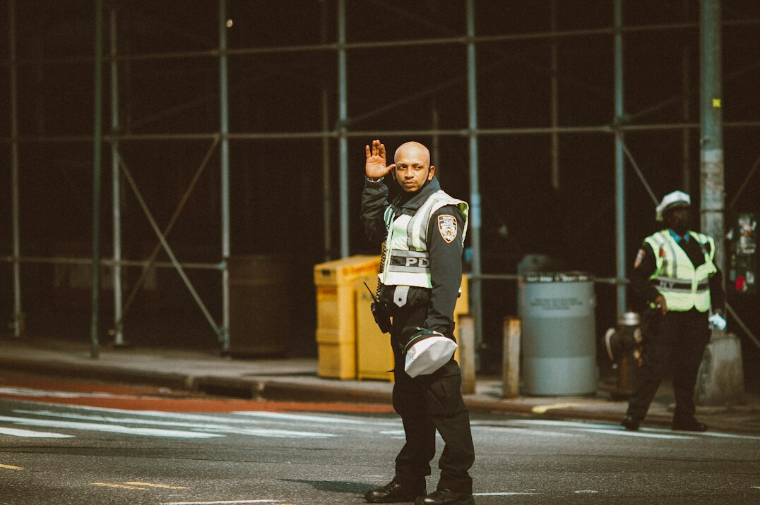 store detective watching customers