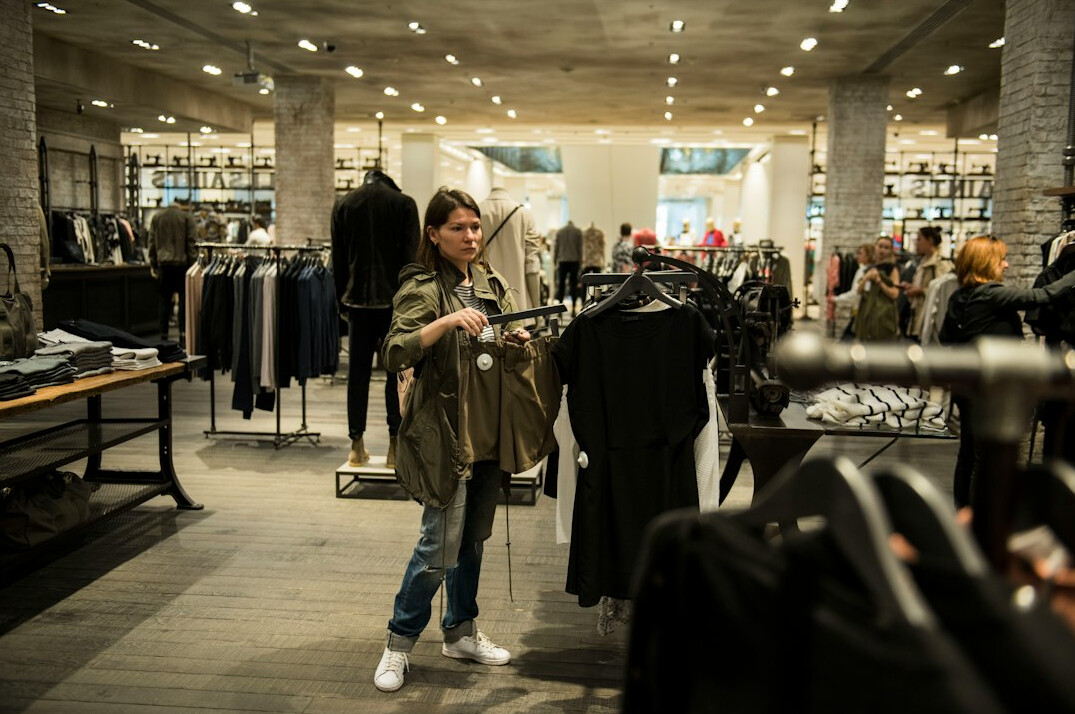 store detective monitoring shoppers