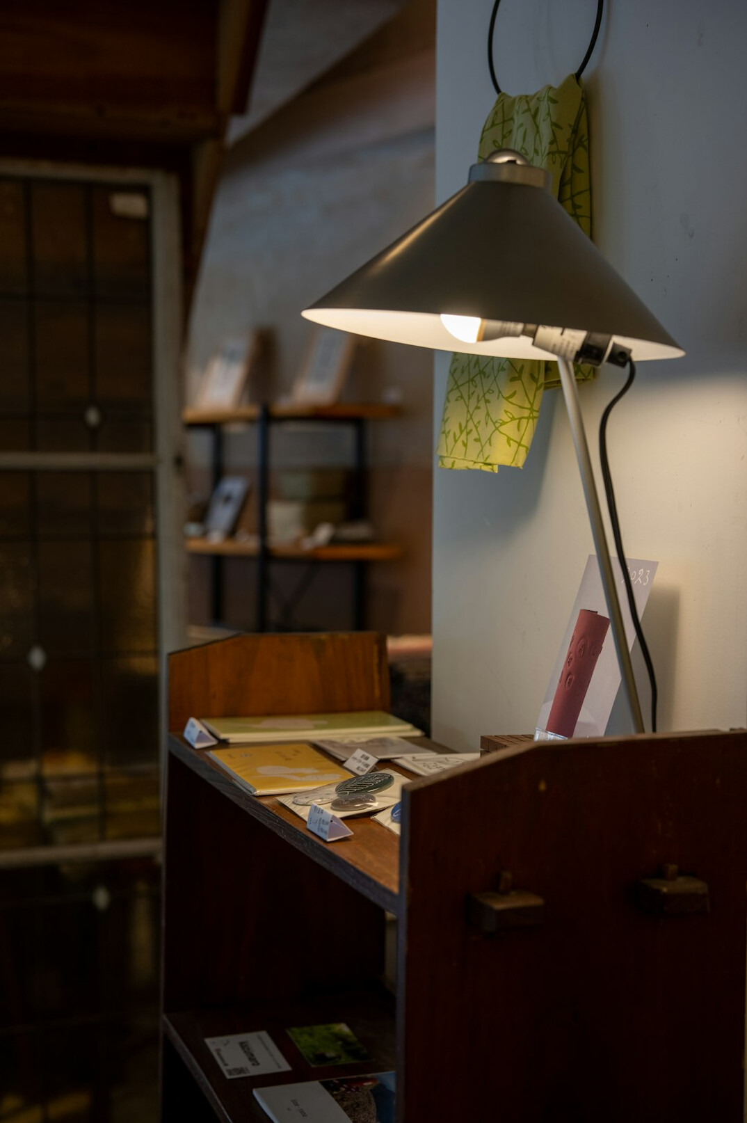 Vintage desk lamp illuminating papers and documents